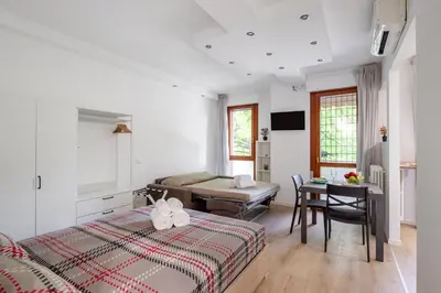 Letto o letti in una camera di GuestHost - Padova cozy apartments near the Hospital