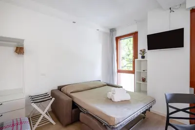 Letto o letti in una camera di GuestHost - Padova cozy apartments near the Hospital