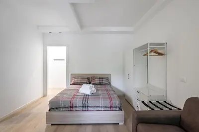 Letto o letti in una camera di GuestHost - Padova cozy apartments near the Hospital
