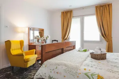 Letto o letti in una camera di Artemide Relais