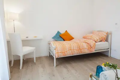 Letto o letti in una camera di Artemide Relais