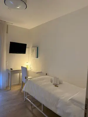 Letto o letti in una camera di Artemide Relais