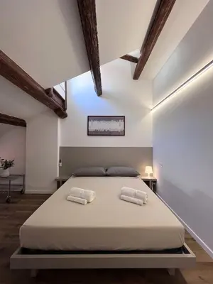 Letto o letti in una camera di Appartamento Palazzo