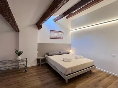 Letto o letti in una camera di Appartamento Palazzo