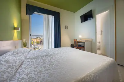 Letto o letti in una camera di Hotel Portofino