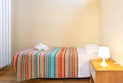 Letto o letti in una camera di Ca' dei Mercanti by Sarlux