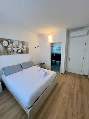 Letto o letti in una camera di Cecia's House
