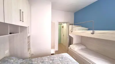 Letto o letti in una camera di Casa Azzurra Zona Bau Bau Beach