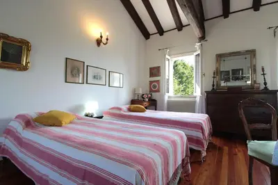Letto o letti in una camera di Casa Ballo delle Streghe, Garden, Montebelluna