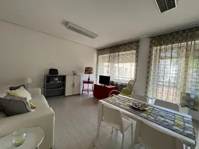 TV o dispositivi per l'intrattenimento presso Terrace Apartment Venice - White