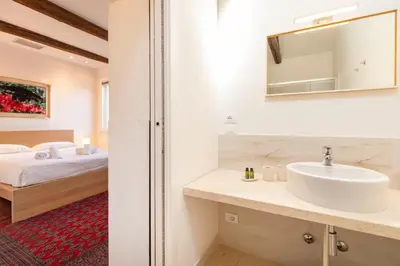 Planimetria di ComeCasa 3 min walk from San Marco Apartment with beautiful roof terrace