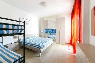 Letto o letti in una camera di Residence Torino