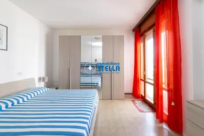 Letto o letti in una camera di Residence Torino