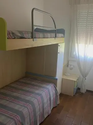 Letto o letti in una camera di Spacious apartment in Isola Verde for 5 people Ca' Zadra