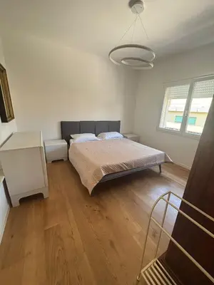 Letto o letti in una camera di Jesolo Piazza Mazzini