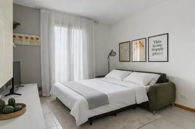 Letto o letti in una camera di Your retreat in Mestre - Venezia comoda a due passi