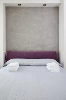 Letto o letti in una camera di Art-inn