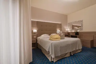 Letto o letti in una camera di Hotel Garden Terme