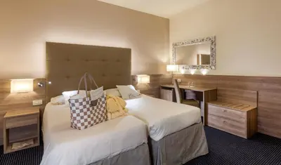Letto o letti in una camera di Hotel Garden Terme