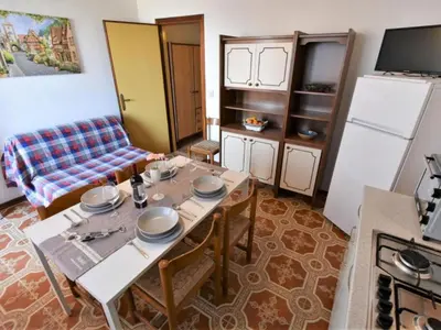 Cucina o angolo cottura di Charming holiday home in Rosolina Mare