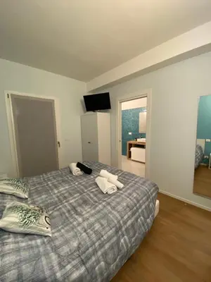 Letto o letti in una camera di Room259