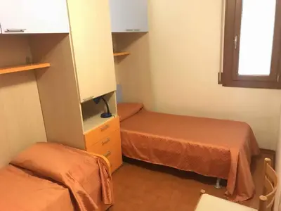 Letto o letti in una camera di Apartment in Lido di Jesolo 54503