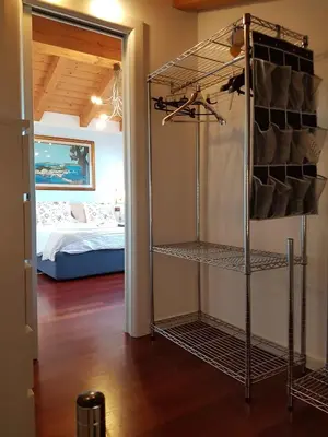Letto o letti in una camera di B&B Melograno MC