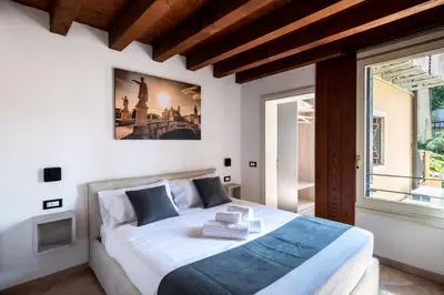 Letto o letti in una camera di GuestHost - Santo 86 Luxury Rooms