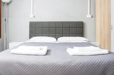 Letto o letti in una camera di room with private bathrooms diedo 2
