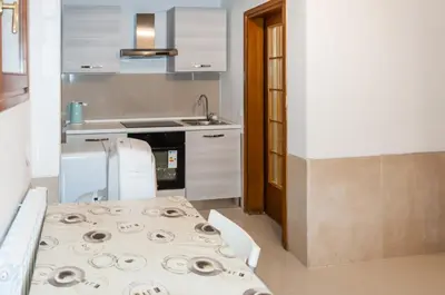 Cucina o angolo cottura di room with private bathroom Stella 1