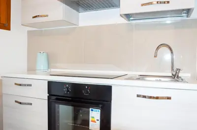 Cucina o angolo cottura di room with private bathroom Stella 1