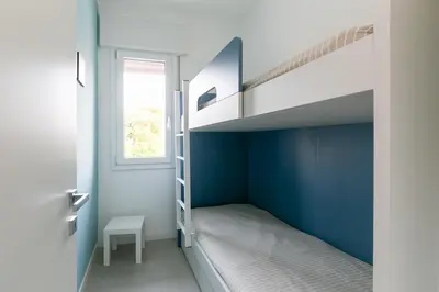 Letto o letti in una camera di Condominio Mara