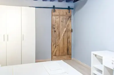 Letto o letti in una camera di room with private bathroom Stella 2