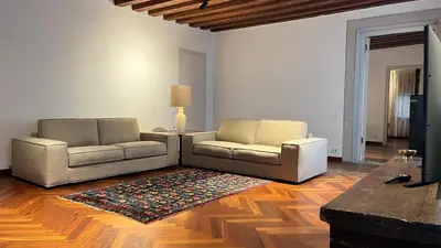 Area soggiorno di Comedia by Suites alla Maddalena