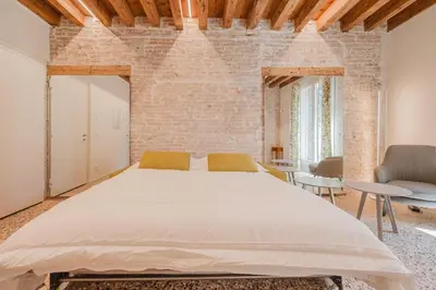 Letto o letti in una camera di San Matteo Rialto Terrace Apt