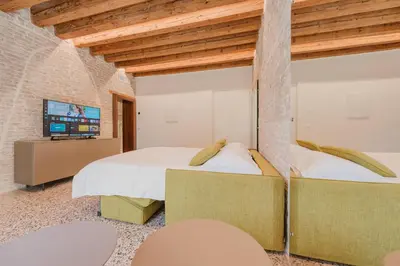 Letto o letti in una camera di San Matteo Rialto Terrace Apt