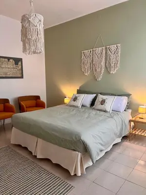 Letto o letti in una camera di Casa Lolò