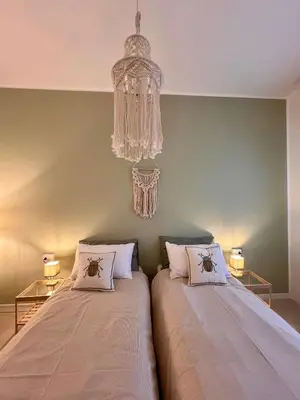 Letto o letti in una camera di Casa Lolò