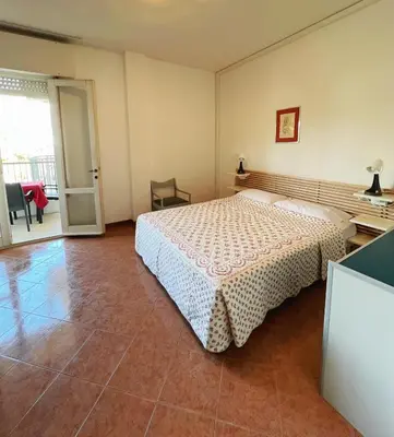 Letto o letti in una camera di Holiday Jesolo