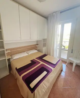 Letto o letti in una camera di Holiday Jesolo