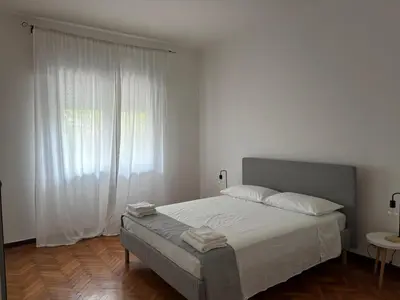 Letto o letti in una camera di suite apartment Mestre - strategic to Venice