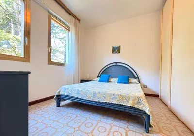 Letto o letti in una camera di Blu Mare Piscina Spiaggia Giardino e Centro