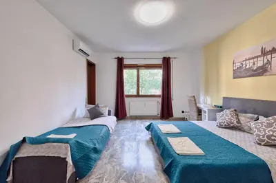 Letto o letti in una camera di Bellavista Palladio Apartment