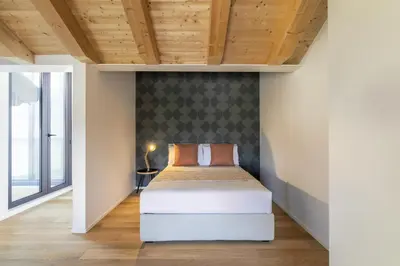 Letto o letti in una camera di Molino 6 by WelcHome