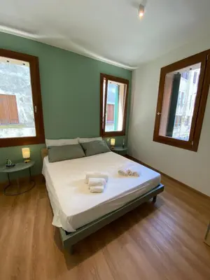 Letto o letti in una camera di Ca' Monsignor Vittore