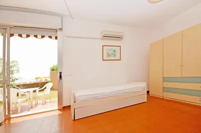 Letto o letti in una camera di Residence Garuda