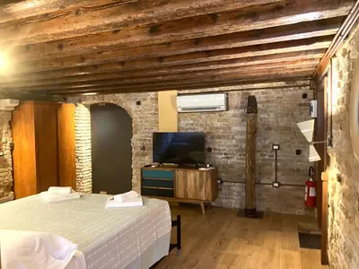 Letto o letti in una camera di Cà Michiel