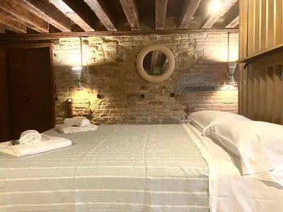 Letto o letti in una camera di Cà Michiel