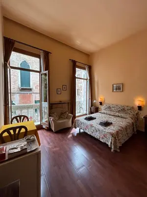 Letto o letti in una camera di Bed and Breakfast Querini San Marco