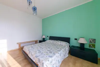 Letto o letti in una camera di Nobili 17 - Carraro Immobiliare - Family Apartments